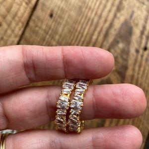 Baguette zirconia gold hoops.